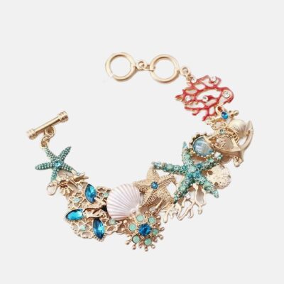 Svart halsband med snäckskal i roséguld